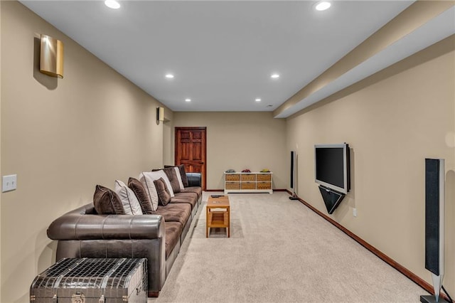 living room featuring recessed lighting, carpet, and baseboards