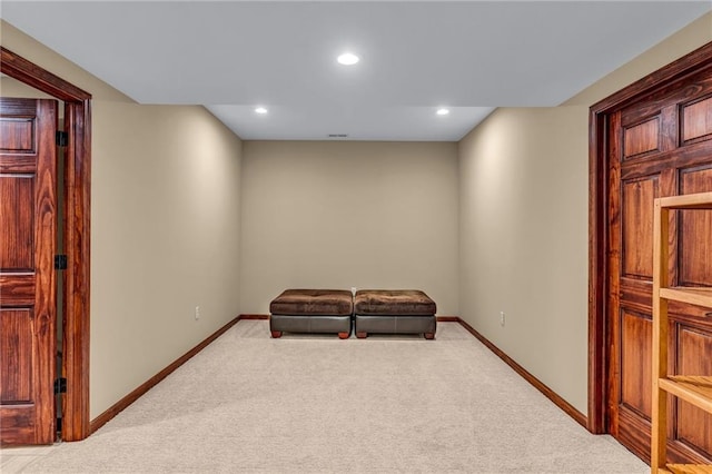 living area with light colored carpet, baseboards, and recessed lighting