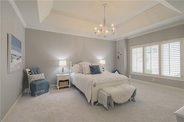 carpeted bedroom featuring a raised ceiling, a chandelier, crown molding, and baseboards