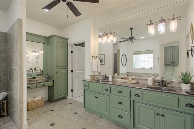 bathroom featuring ceiling fan, tile patterned flooring, and double vanity