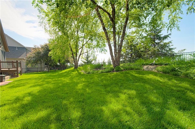 view of yard with a deck