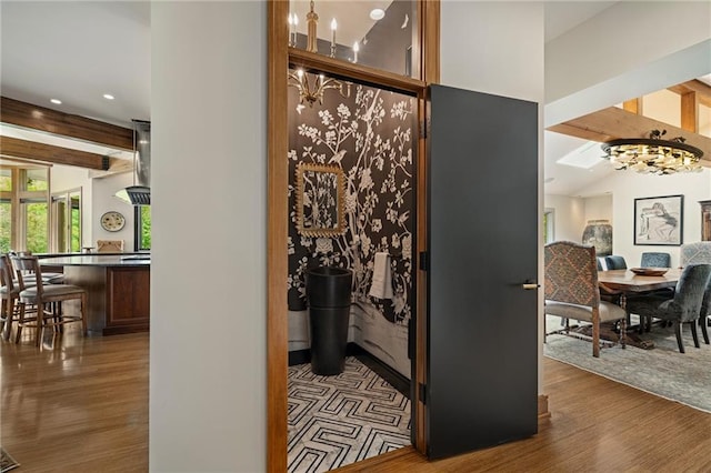 8700 Lee Blvd, Leawood, KS 66206 - hallway with wood finished floors, a chandelier, and recessed lighting