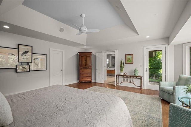 8700 Lee Blvd, Leawood, KS 66206 - bedroom featuring access to outside, dark wood finished floors, recessed lighting, a tray ceiling, and baseboards