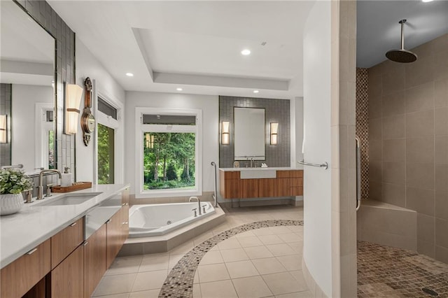 8700 Lee Blvd, Leawood, KS 66206 - bathroom with tiled shower, a whirlpool tub, two vanities, recessed lighting, and tile patterned flooring
