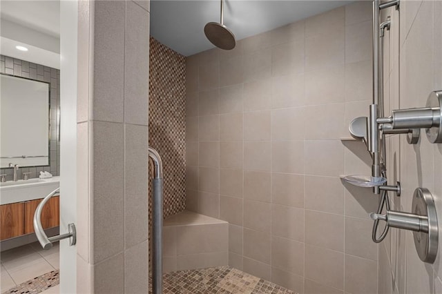 8700 Lee Blvd, Leawood, KS 66206 - full bath featuring tiled shower, vanity, tile patterned floors, and recessed lighting