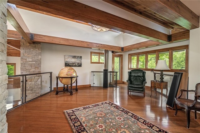 8700 Lee Blvd, Leawood, KS 66206 - sitting room with beam ceiling, wood finished floors, plenty of natural light, and baseboards