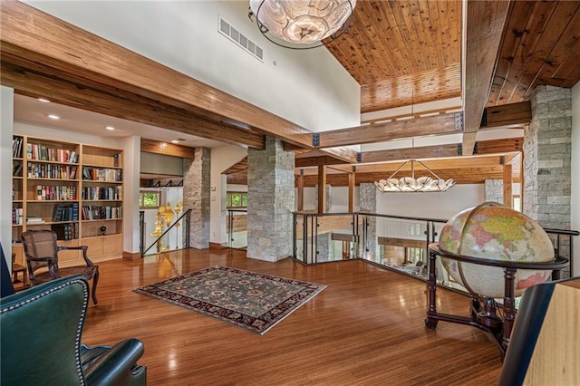 8700 Lee Blvd, Leawood, KS 66206 - sitting room featuring a chandelier, an upstairs landing, wood finished floors, and wood ceiling