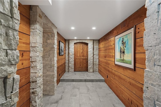 8700 Lee Blvd, Leawood, KS 66206 - hall with wooden walls and recessed lighting
