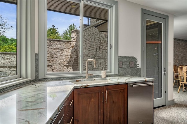 8700 Lee Blvd, Leawood, KS 66206 - kitchen with dishwasher, a sink, backsplash, and light stone counters