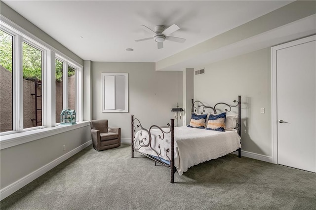 8700 Lee Blvd, Leawood, KS 66206 - bedroom with carpet floors, baseboards, and a ceiling fan
