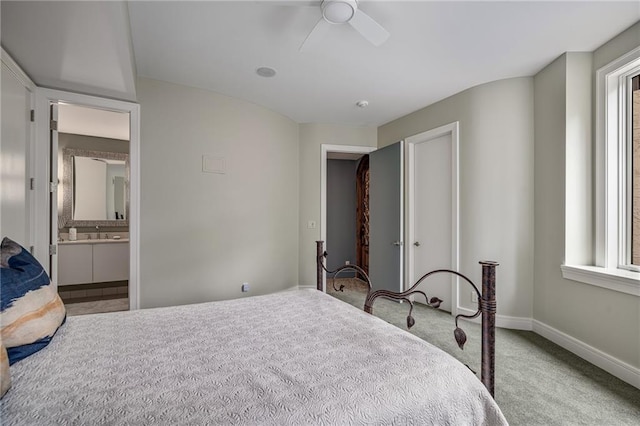 8700 Lee Blvd, Leawood, KS 66206 - carpeted bedroom with baseboards, a ceiling fan, and ensuite bathroom