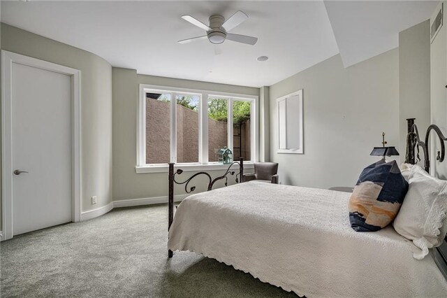 8700 Lee Blvd, Leawood, KS 66206 - carpeted bedroom featuring baseboards and a ceiling fan