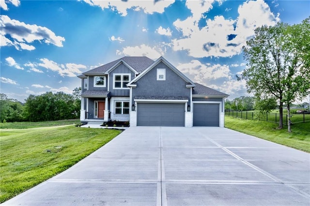 7812 N Spruce Ave, Kansas City, MO 64119 - view of front of property with driveway and an attached garage