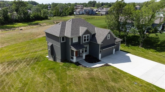 7812 N Spruce Ave, Kansas City, MO 64119 - view of subject property featuring a tree filled landscape