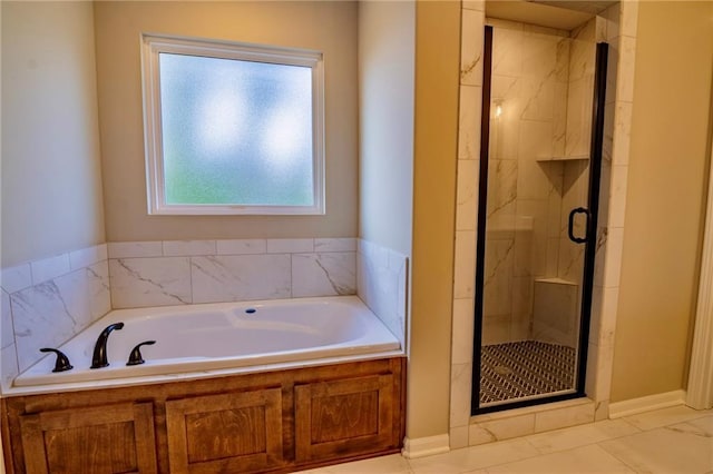 7812 N Spruce Ave, Kansas City, MO 64119 - bathroom with a shower stall and a garden tub