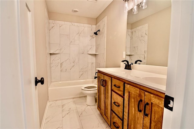 7812 N Spruce Ave, Kansas City, MO 64119 - full bathroom with marble finish floors, toilet, double vanity, shower / washtub combination, and baseboards