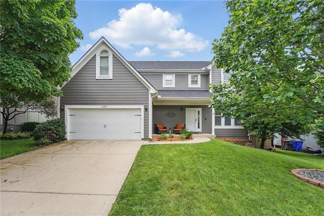 12287 S Mullen Rd, Olathe, KS 66062 - traditional-style house featuring a front yard, driveway, a garage, and roof with shingles