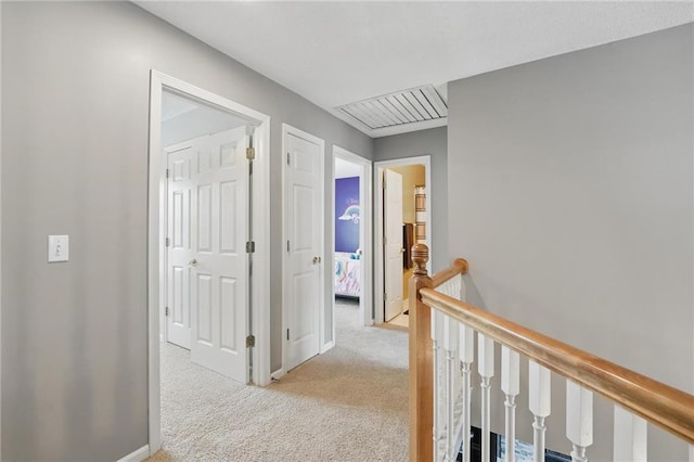 12287 S Mullen Rd, Olathe, KS 66062 - corridor with an upstairs landing, carpet, and baseboards