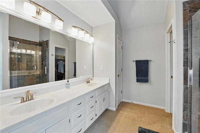 12287 S Mullen Rd, Olathe, KS 66062 - full bath with double vanity, a stall shower, baseboards, and a spacious closet