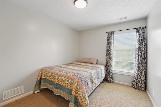 12287 S Mullen Rd, Olathe, KS 66062 - carpeted bedroom with baseboards and a textured ceiling