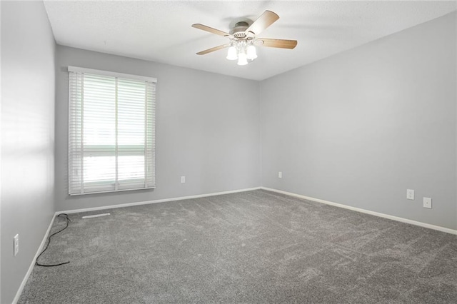 10981 Rosehill Rd, Overland Park, KS 66210 - spare room featuring carpet, baseboards, and ceiling fan