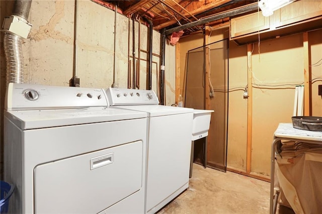 10981 Rosehill Rd, Overland Park, KS 66210 - washroom with washing machine and dryer