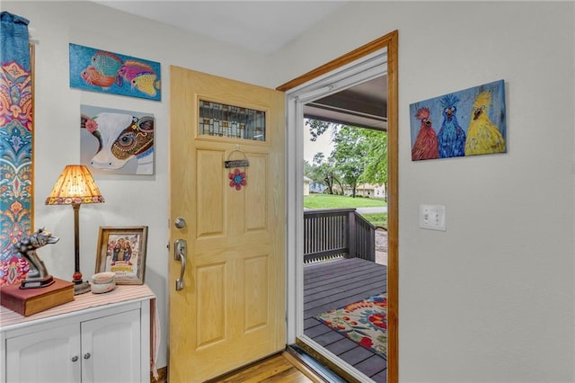 203 Pine St, Wellsville, KS 66092 - foyer entrance featuring light wood-type flooring