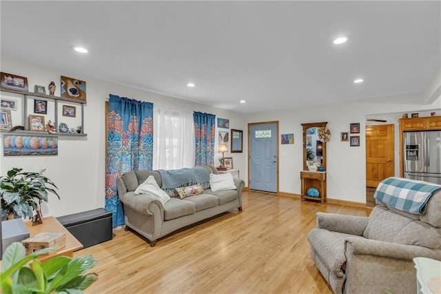 203 Pine St, Wellsville, KS 66092 - living room with light wood-type flooring, recessed lighting, and baseboards