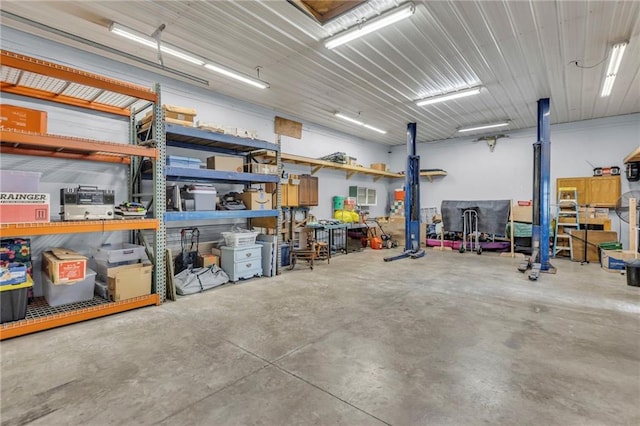 203 Pine St, Wellsville, KS 66092 - garage featuring a workshop area