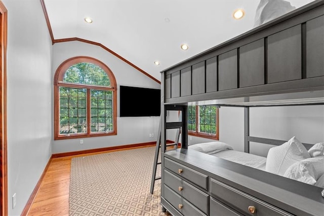 bedroom featuring vaulted ceiling, recessed lighting, light wood-style flooring, and baseboards