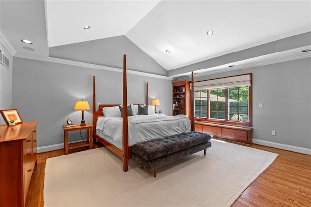 bedroom featuring wood finished floors, vaulted ceiling, baseboards, recessed lighting, and ornamental molding