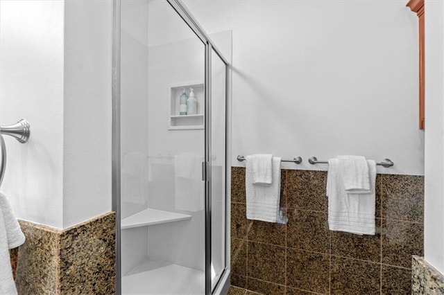 bathroom featuring a shower stall
