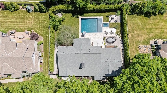 drone / aerial view of a pool area