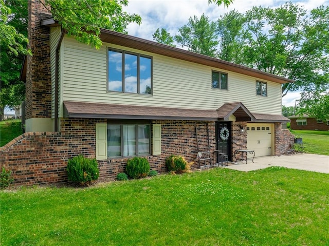 view of front facade with brick siding, driveway, a garage, a front yard, and a chimney