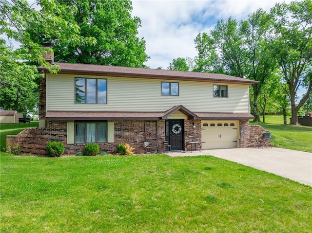 view of front facade with an attached garage, a chimney, concrete driveway, a front yard, and brick siding