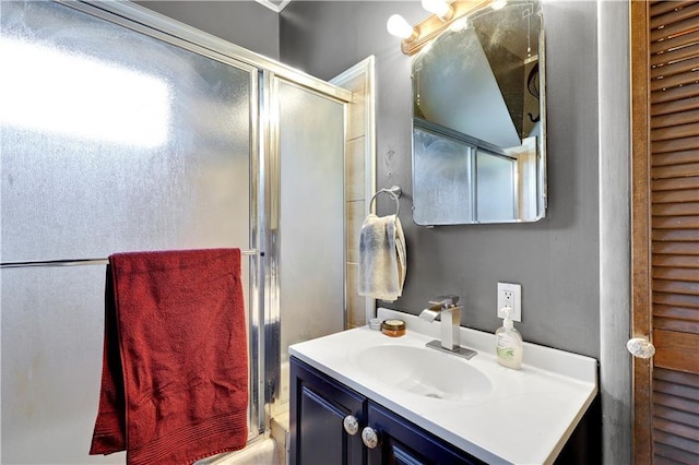 827 Pacific Ave, Osawatomie, KS 66064 - full bathroom featuring vanity and an enclosed shower