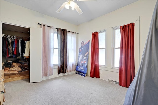 827 Pacific Ave, Osawatomie, KS 66064 - carpeted bedroom featuring a closet and ceiling fan