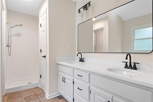 1051 E 121st St, Olathe, KS 66061 - full bath featuring double vanity, a tile shower, and baseboards