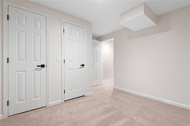 1051 E 121st St, Olathe, KS 66061 - unfurnished bedroom with baseboards and carpet flooring