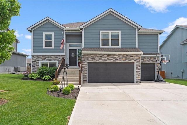 16025 Craig St, Basehor, KS 66007 - view of front of home featuring an attached garage, a front lawn, concrete driveway, stone siding, and a shingled roof
