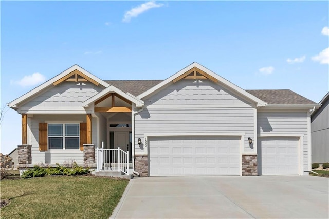 1532 SW Arbor Valley Dr, Lees Summit, MO 64082 - craftsman inspired home featuring an attached garage, concrete driveway, stone siding, a front lawn, and roof with shingles