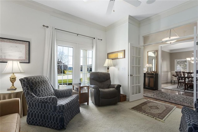 4704 SW Gull Point Dr, Lees Summit, MO 64082 - sitting room with french doors, plenty of natural light, crown molding, a ceiling fan, and carpet floors
