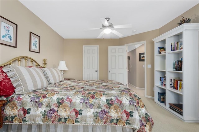 4704 SW Gull Point Dr, Lees Summit, MO 64082 - bedroom with light colored carpet, baseboards, and a ceiling fan