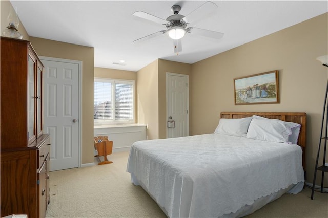 4704 SW Gull Point Dr, Lees Summit, MO 64082 - bedroom featuring light colored carpet, baseboards, and ceiling fan