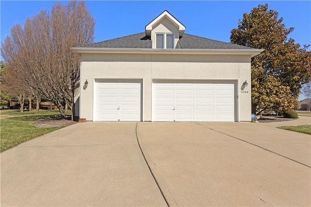 4704 SW Gull Point Dr, Lees Summit, MO 64082 - garage with concrete driveway