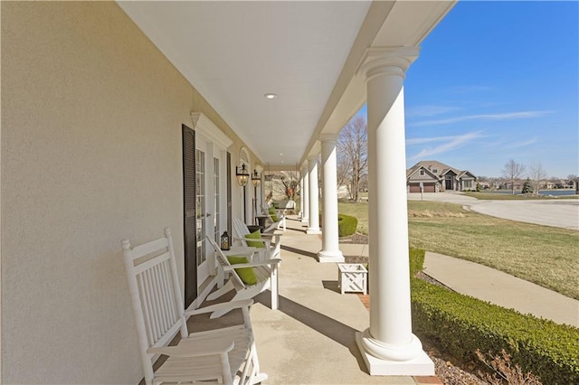 4704 SW Gull Point Dr, Lees Summit, MO 64082 - view of patio featuring covered porch