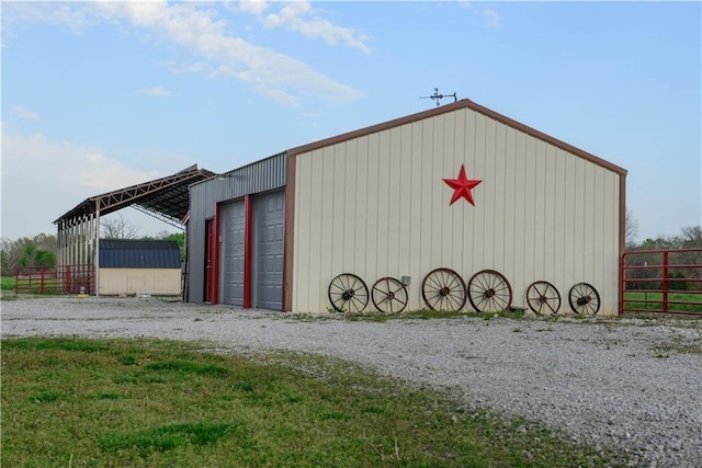 6721 S Read Rd Unit 1, Pleasanton, KS 66075 - detached garage with fence