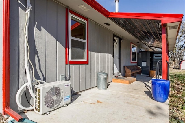 6721 S Read Rd Unit 1, Pleasanton, KS 66075 - view of patio / terrace featuring ac unit