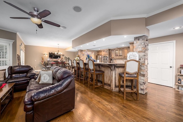 9500 Georgia Ave, Kansas City, KS 66109 - living area with ceiling fan, crown molding, dark wood-style floors, and a chandelier