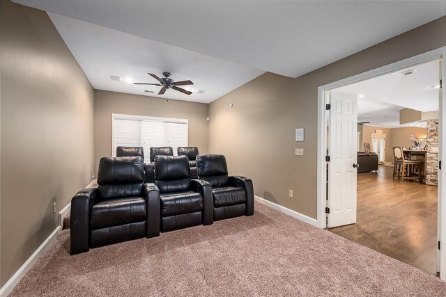 9500 Georgia Ave, Kansas City, KS 66109 - home theater featuring ceiling fan, baseboards, and carpet